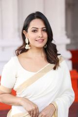 Anita in simple white saree